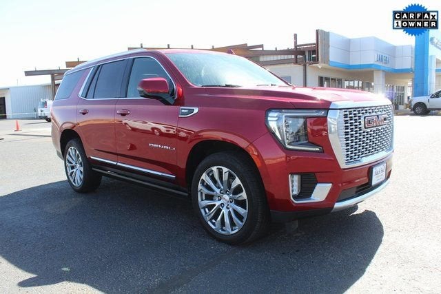 2022 GMC Yukon Denali in Cayenne Red Tintcoat — front three-quarter view