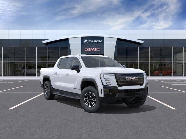 2026 GMC Sierra EV Elevation Standard Range in Summit White — front three-quarter view