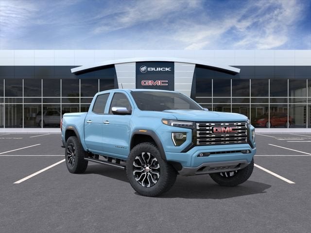 2026 GMC Canyon Denali in Glacier Metallic — front three-quarter view