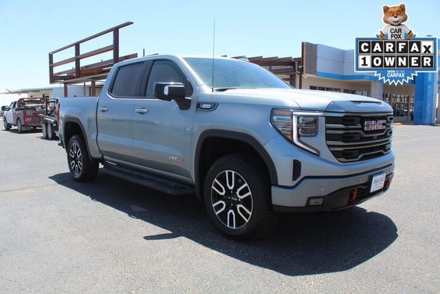 2024 GMC Sierra 1500 AT4 in Sterling Metallic — front three-quarter view